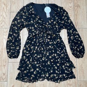 boohoo Plus ruffle hem floral mini dress.